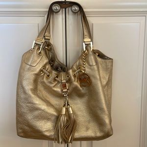 Michael Kors Gold Leather Camden Tassel Drawstring Shoulder Bag
